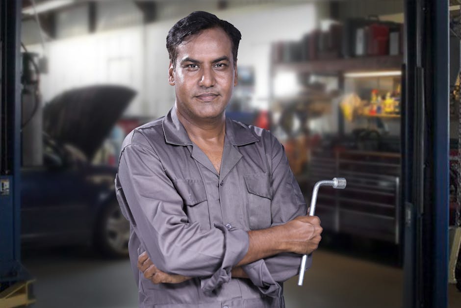 Professional auto glass technician assessing a vehicle windshield